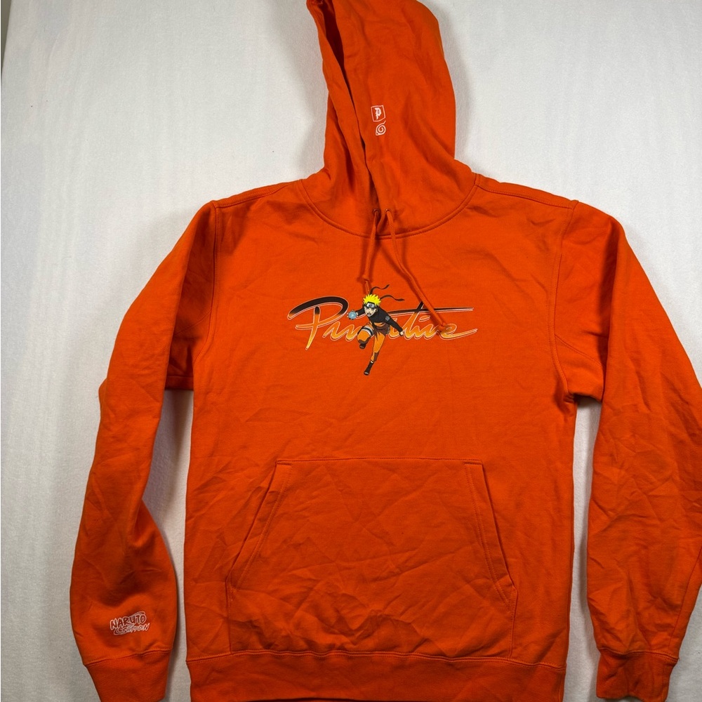 Primitive Orange Pullover Hoodie with Graphic Character Logo